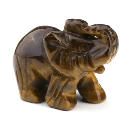 A polished brown tiger’s eye elephant figurine with intricate carved details.
