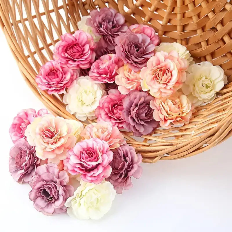 A basket filled with artificial roses in soft pink, mauve, and cream hues.