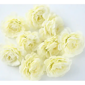 A cluster of delicate, pale yellow artificial roses with soft, layered petals.