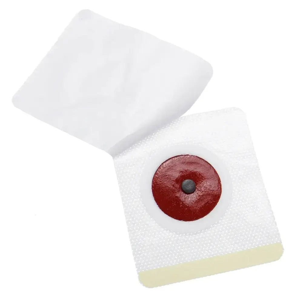 White adhesive bandage with a red circular pad and black center magnet