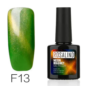 Green and gold shimmering neon magnet gel polish in a black bottle labeled ’rosalind.’