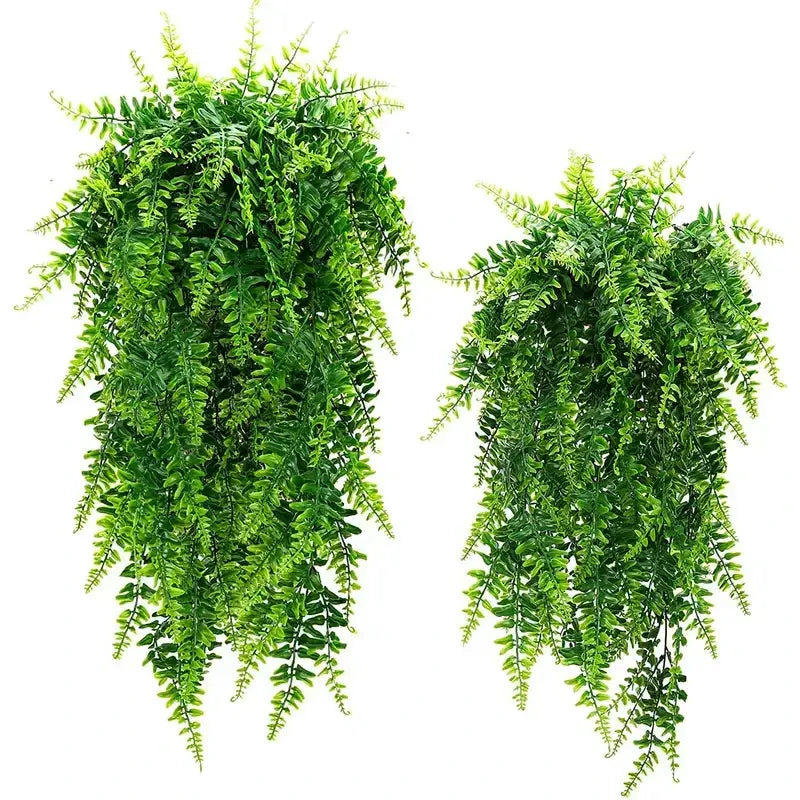 Two artificial green fern hanging plants with detailed, layered fronds.