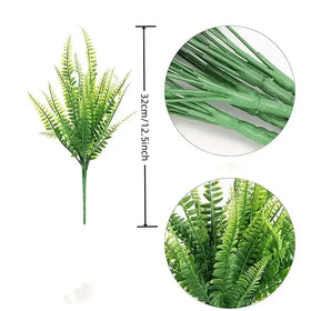 Green artificial fern plant with detailed fronds and a sturdy stem.