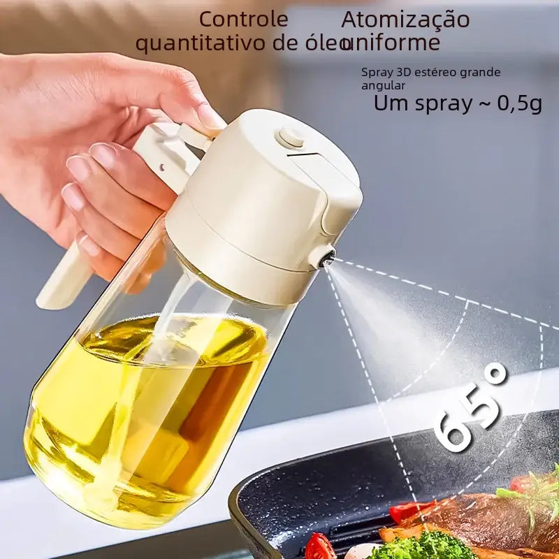 Cream-colored plastic spray oil dispenser with a clear glass body filled with golden-yellow cooking oil.