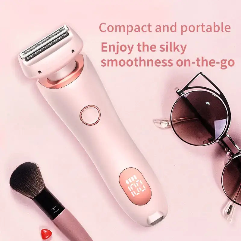 Pink and rose gold electric razor with a sleek, compact design.
