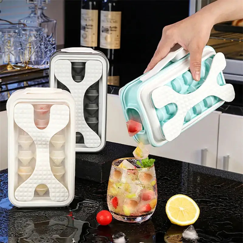 Light blue and white silicone ice cube trays with a unique x-shaped design.