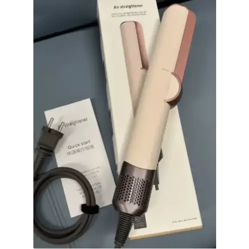 Beige and rose gold dyson air straightener with a perforated black base.