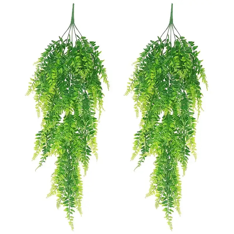 Two artificial green fern hanging plants with detailed leaf patterns and a natural-looking gradient of shades.