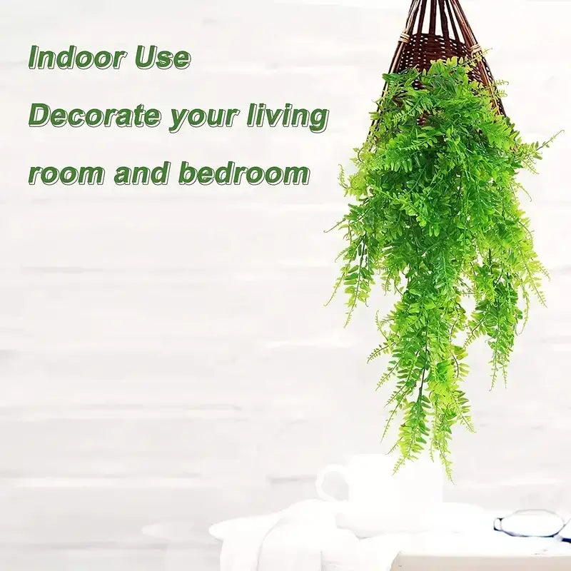 A hanging artificial fern in a woven brown basket, with lush green fronds cascading downward.