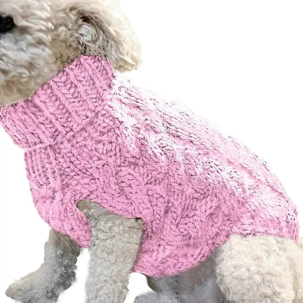 Pink knitted sweater with a textured cable pattern, worn by a small white dog.