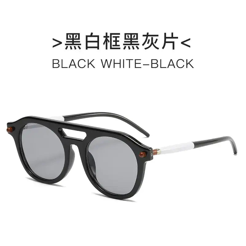 Black and white framed sunglasses with black gray lenses.