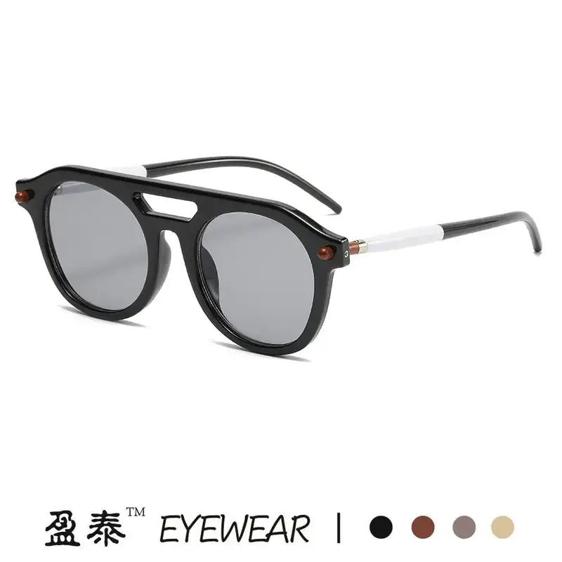Black-framed aviator sunglasses with gray lenses and white temple tips.