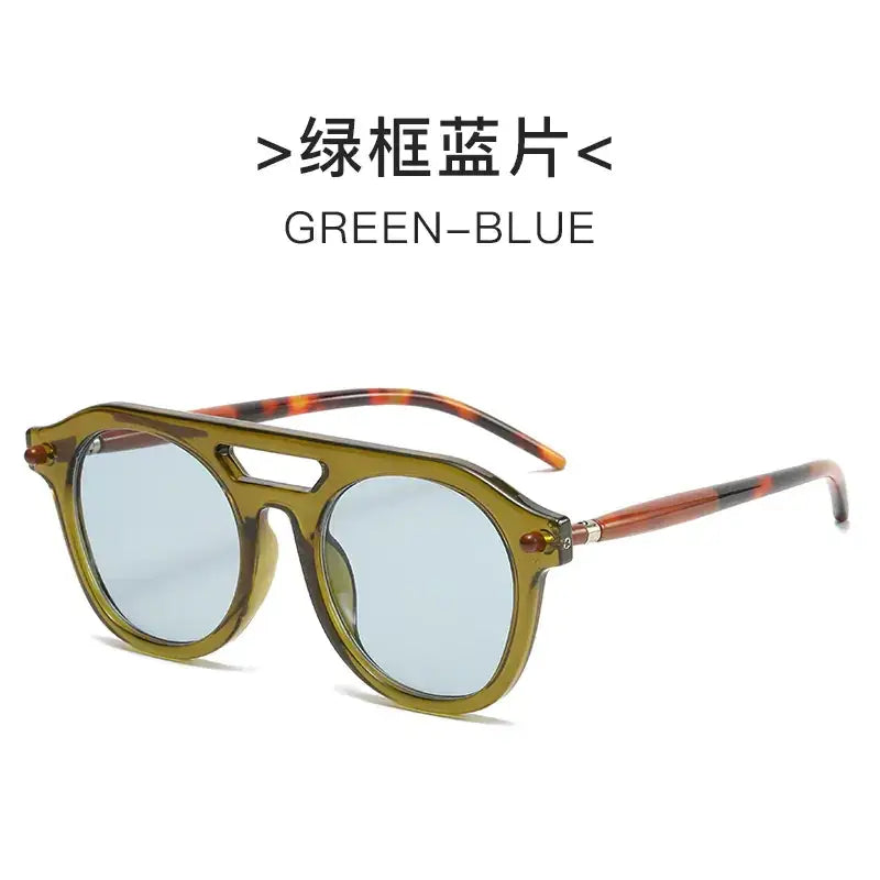Olive-green framed sunglasses with tortoiseshell-patterned temples and light blue mirrored lenses.