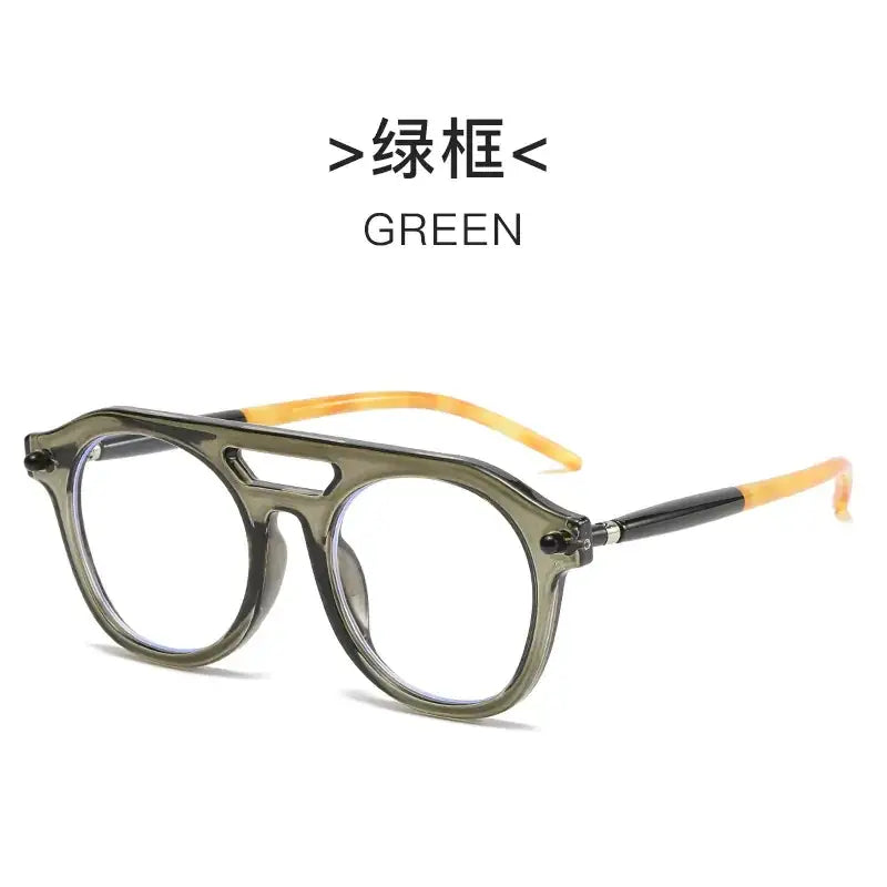 Olive-green acetate glasses with a distinctive aviator-style frame and amber-tinted temple tips.