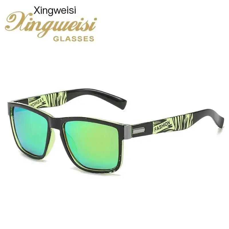 Black-framed sunglasses with vibrant green mirrored lenses and zebra-striped accents on the temples.