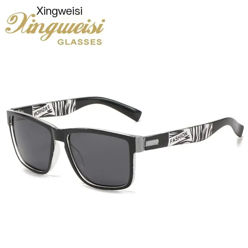 Black and silver rectangular sunglasses with zebra-striped arms featuring the word ’fashion’ in white lettering.
