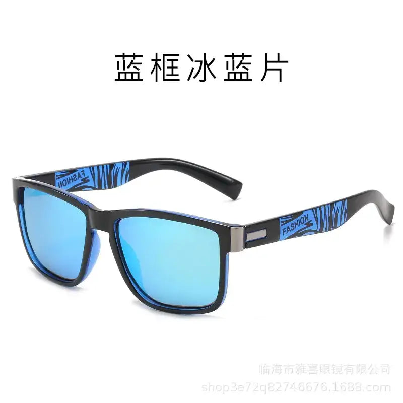 Black-framed sunglasses with icy blue mirrored lenses and a zebra-striped pattern on the temples, featuring ’fashion’ branding.