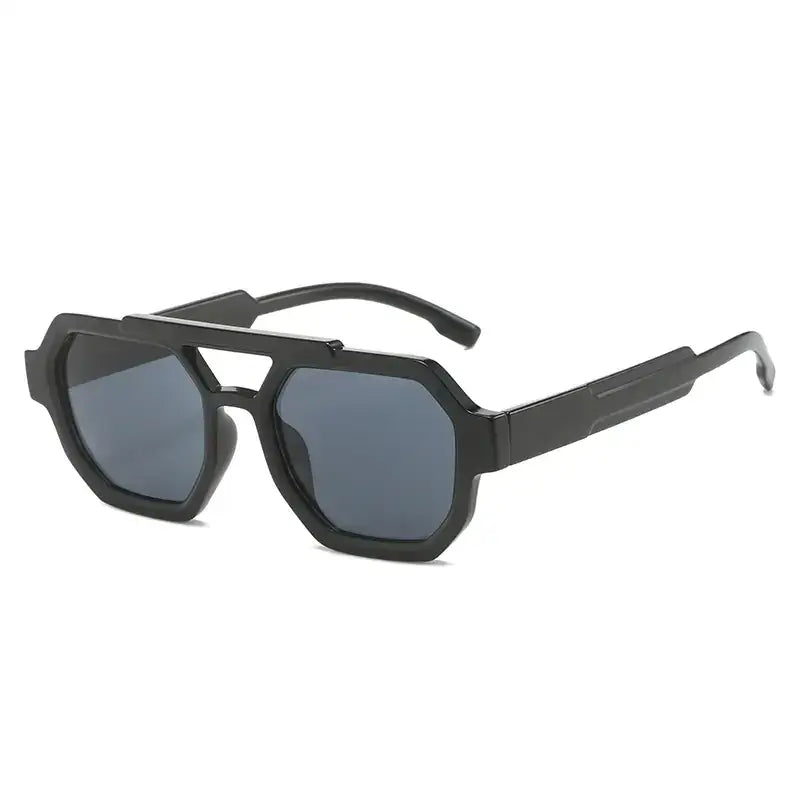 Black octagonal-frame sunglasses with dark gray lenses and a sleek, modern design.