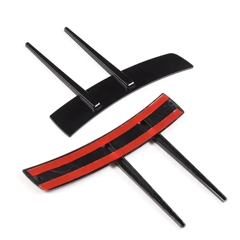 Black and red car side mirror cover trim with glossy finish.