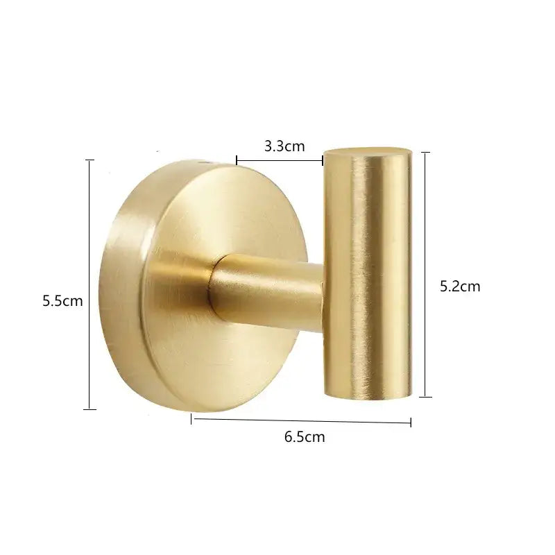 Gold-colored, brushed metal t-shaped wall hook with a circular base.