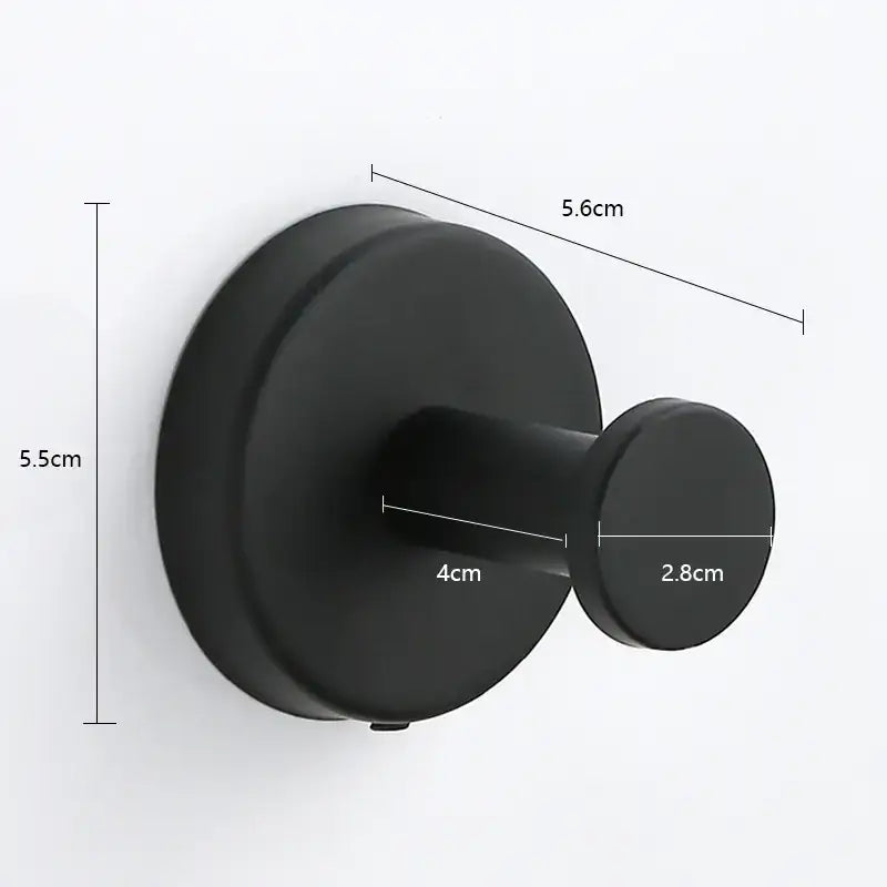 Black matte-finish wall-mounted hook with a circular base and rounded peg.