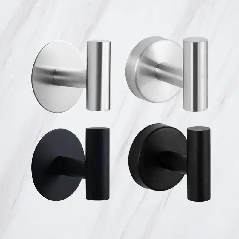 Modern wall-mounted hooks in sleek brushed stainless steel and matte black finishes.