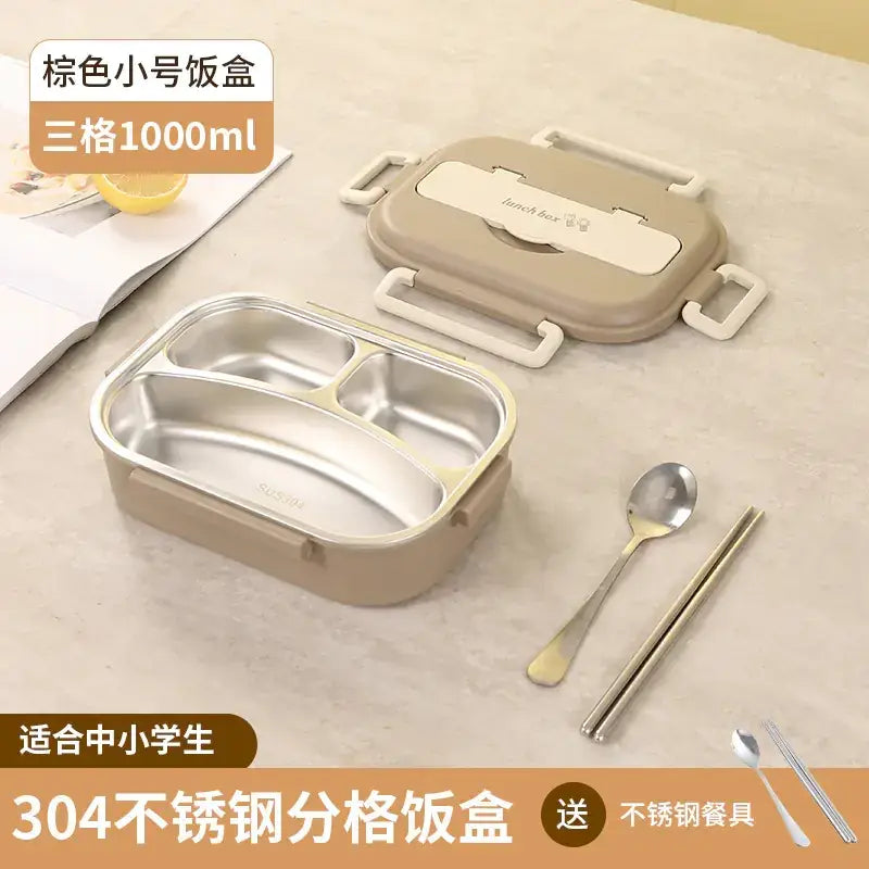 Beige three-compartment lunch box with stainless steel interior and white plastic handles, labeled as 1000ml capacity.