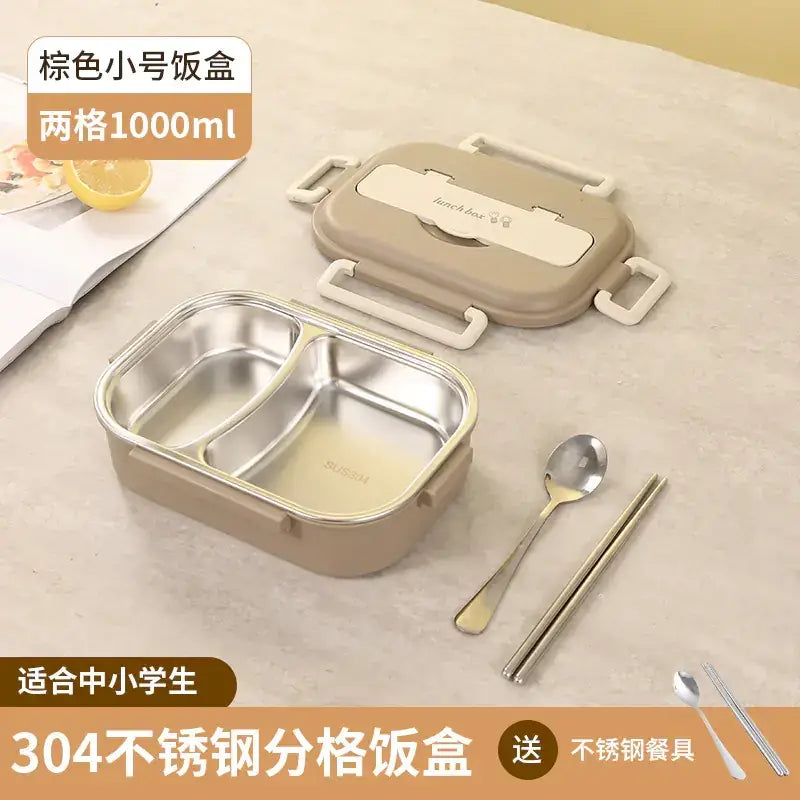 Beige two-compartment stainless steel lunchbox with a matching lid and white plastic handles.