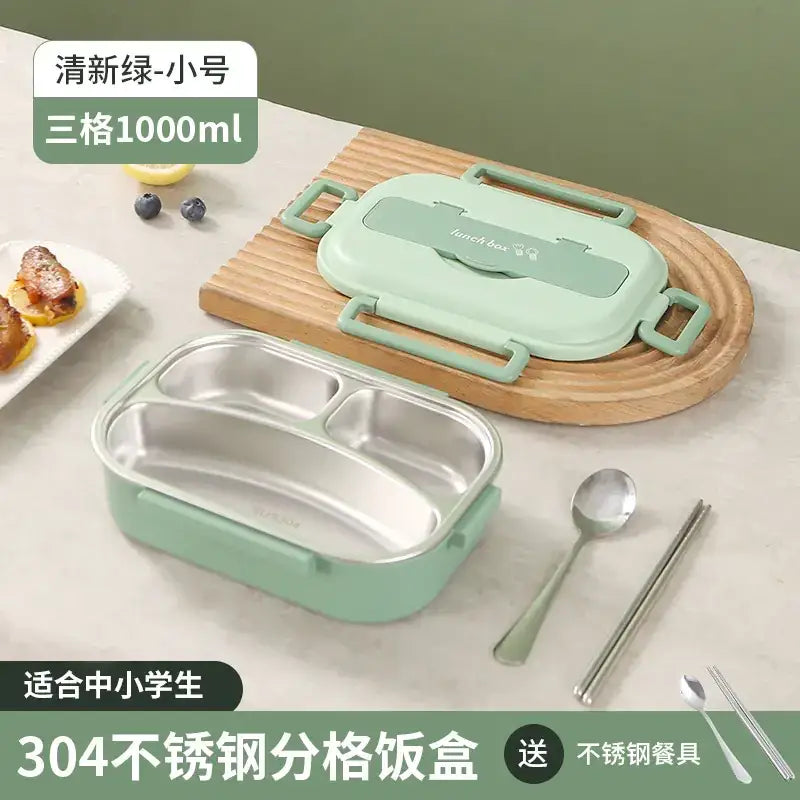 Mint green three-compartment stainless steel lunchbox with a matching lid and handles.