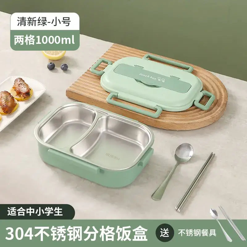 Mint green two-compartment stainless steel lunchbox with a matching lid and side handles.