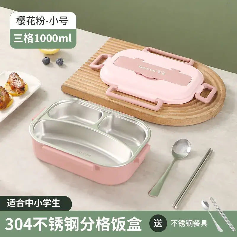 Pink plastic-trimmed stainless steel three-compartment lunchbox with a matching pink lid and handles.
