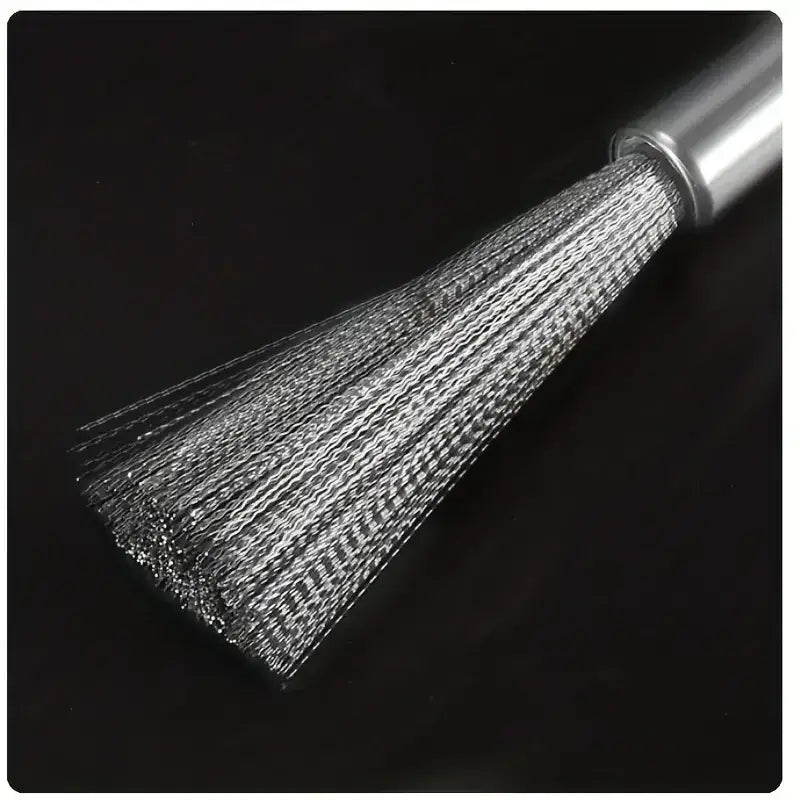 Silver stainless steel wire brush with a cylindrical handle.