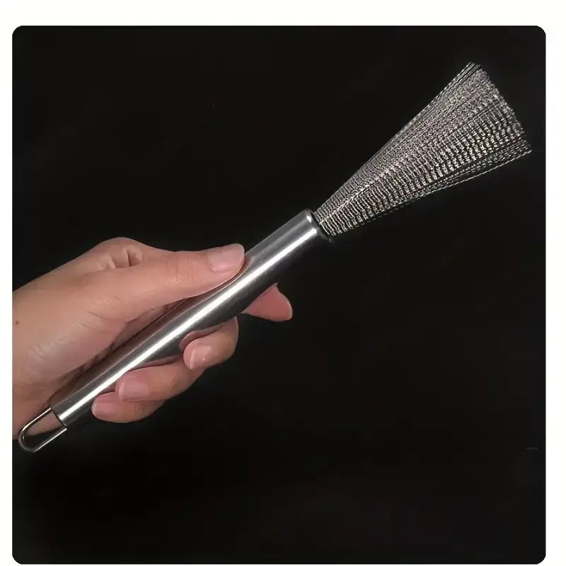 A sleek stainless steel mesh brush with a cylindrical handle and a wide, fan-shaped head of interwoven metal wires.
