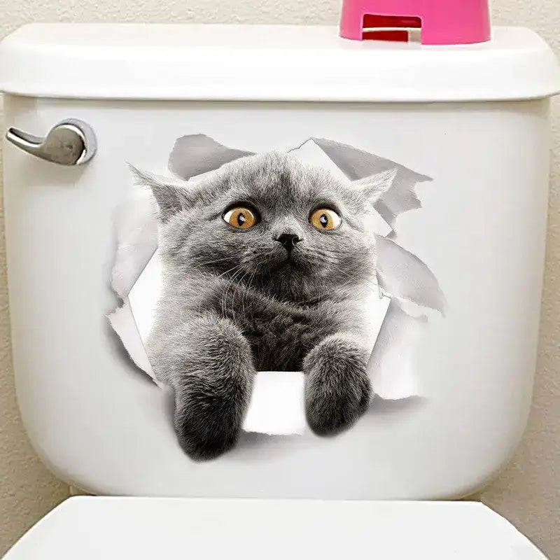 Gray british shorthair cat decal with realistic fur and wide eyes, designed to look like it’s peeking through a torn hole in the toilet tank.