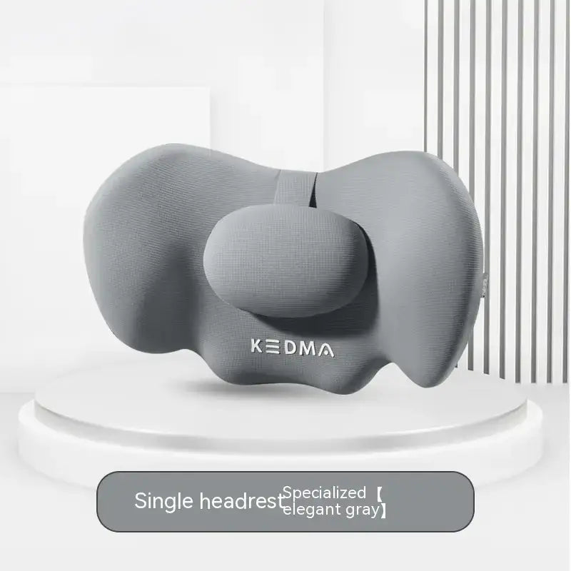 Elegant gray kedma single headrest with a contoured, cushioned design for ergonomic support.