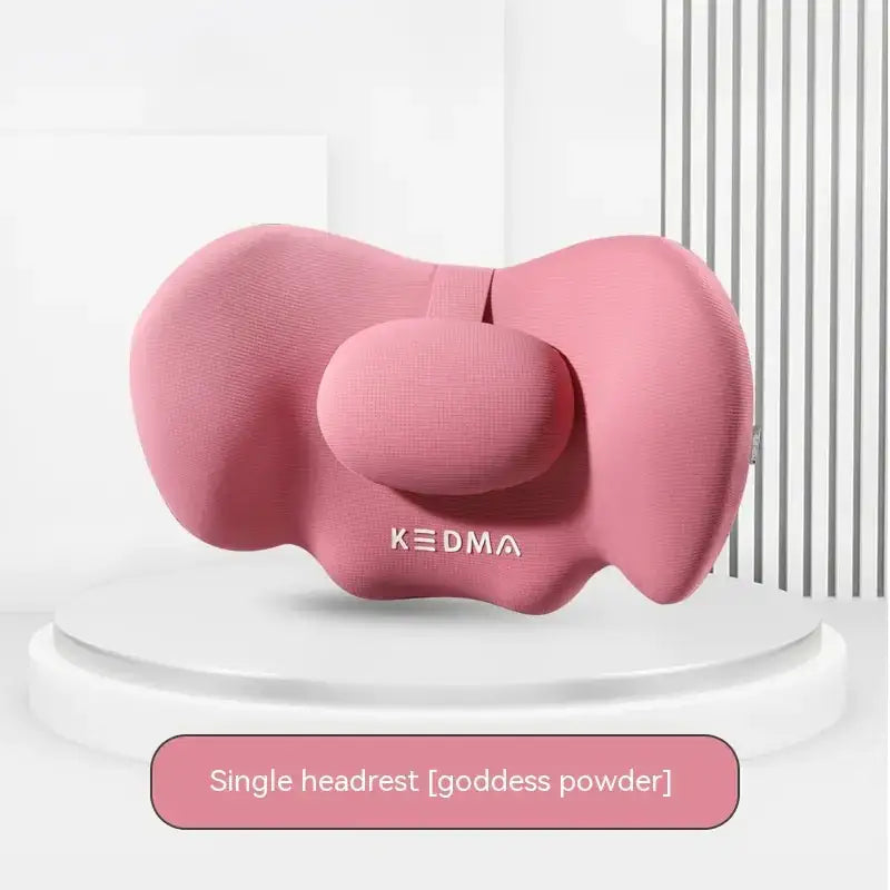 Pink kedma single headrest with a soft, cushioned bow design and central neck support.