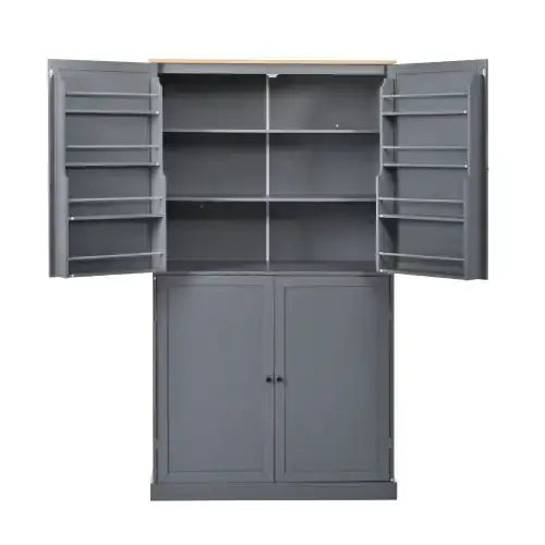 Gray metal storage cabinet with two upper doors featuring built-in shelves and a light wood top, paired with two lower solid doors.