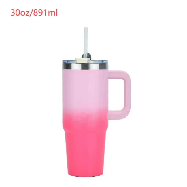 Pink gradient insulated tumbler with a handle and straw.