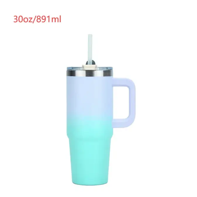 A 30oz insulated tumbler with a gradient finish transitioning from light blue at the top to teal at the bottom, featuring a stainless steel rim and handle.