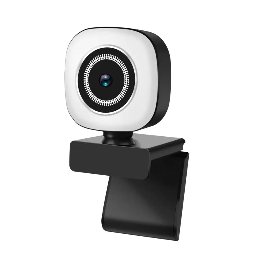 Black and white webcam with a circular lens surrounded by a decorative ring.
