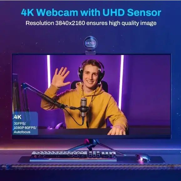 4k webcam with uhd sensor, sleek black and silver design.