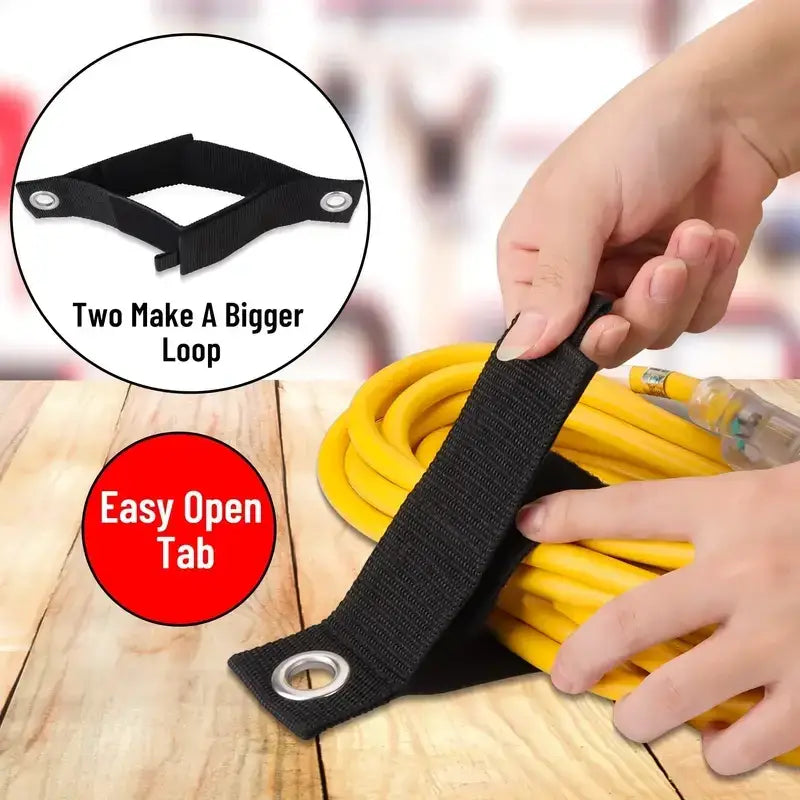 Black fabric strap with metal grommets and an easy-open tab for securing yellow extension cords.