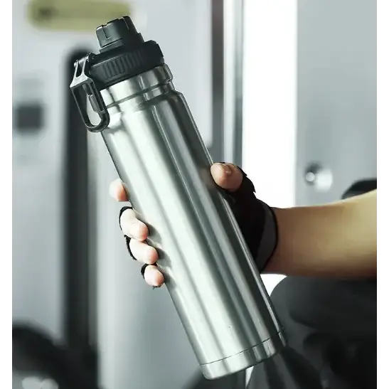 A sleek, stainless steel water bottle with a black screw-on lid and carrying loop.