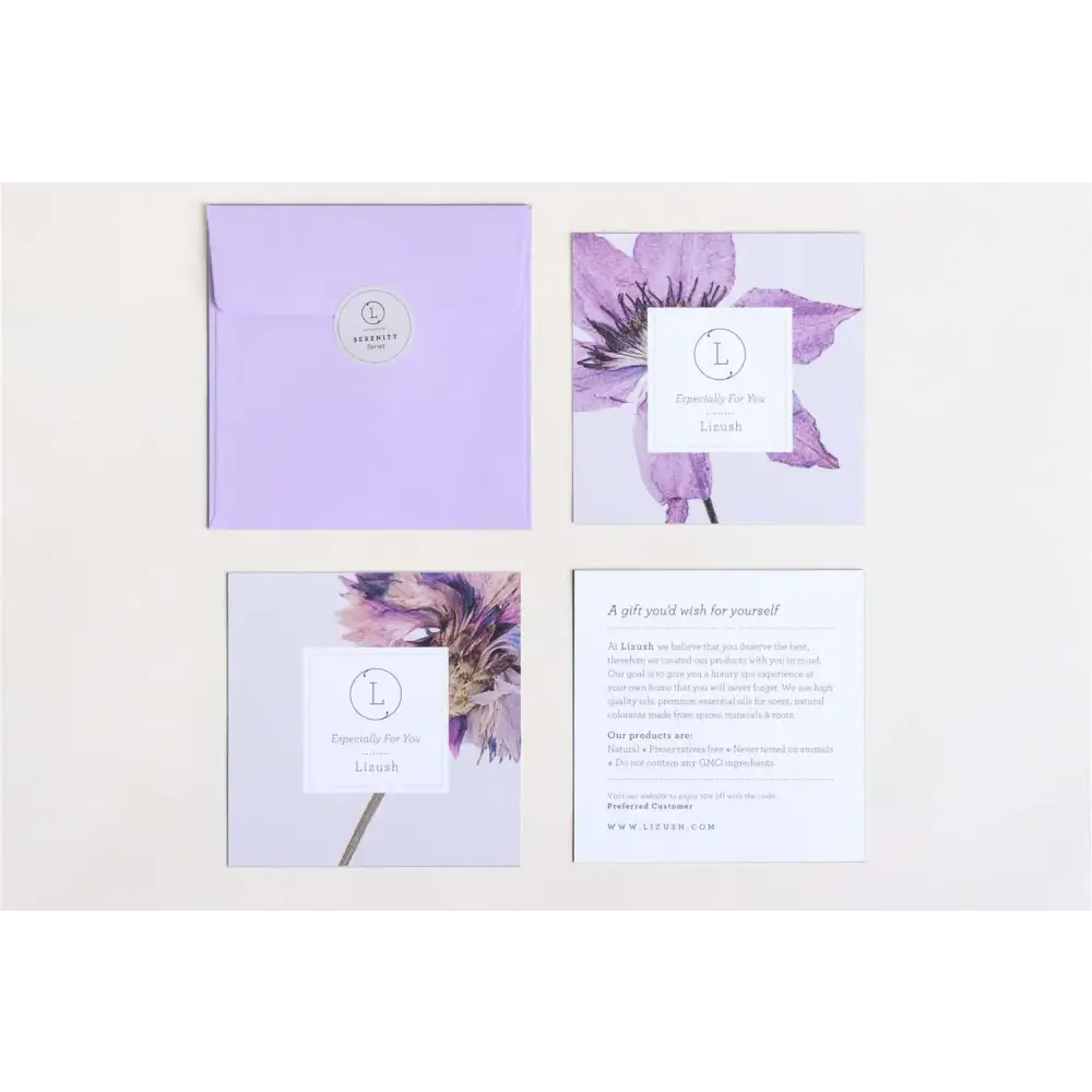 Lilac-colored envelope with a circular silver logo sticker.