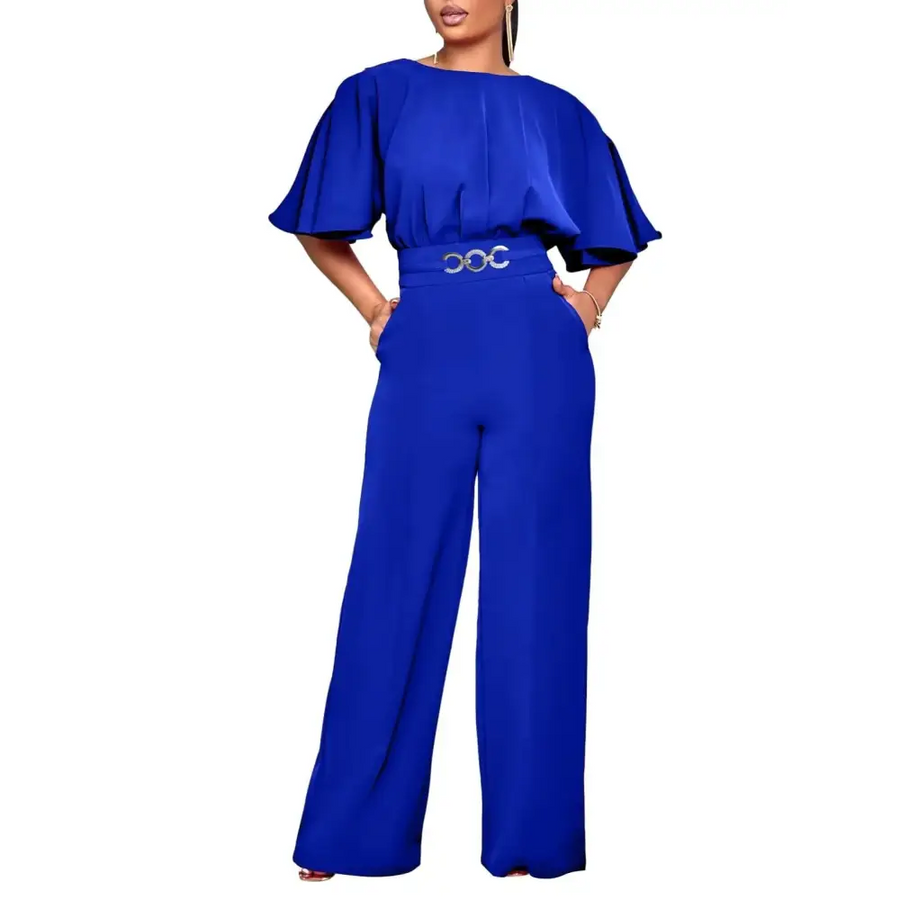 Vibrant royal blue wide-leg jumpsuit with flowing cape sleeves and a silver-toned belt buckle.