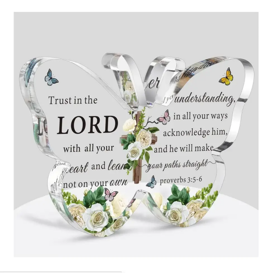 Clear acrylic butterfly-shaped decorative piece featuring engraved biblical verse from proverbs 3:5-6, adorned with printed white roses, green leaves, and small butterflies.