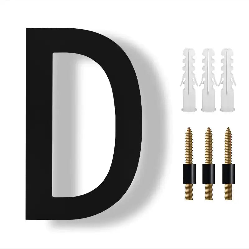 Black, bold, sans-serif letter ’d’ wall plaque with mounting hardware.