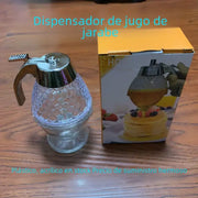 Clear honey dispenser with a silver-toned metal top and handle, featuring a textured hexagonal glass body.