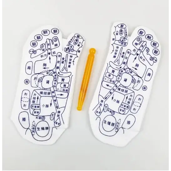 White foot reflexology mats with black printed chinese characters and diagrams, accompanied by a yellow plastic tool.