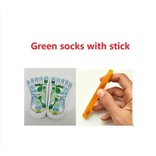 Green foot reflexology socks with colorful printed diagrams and an orange plastic stick for massage.